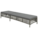 Gray woven PE rattan sun lounger with a cushion and adjustable backrest