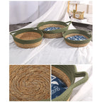 Round woven dog basket with green rim and patterned cushion