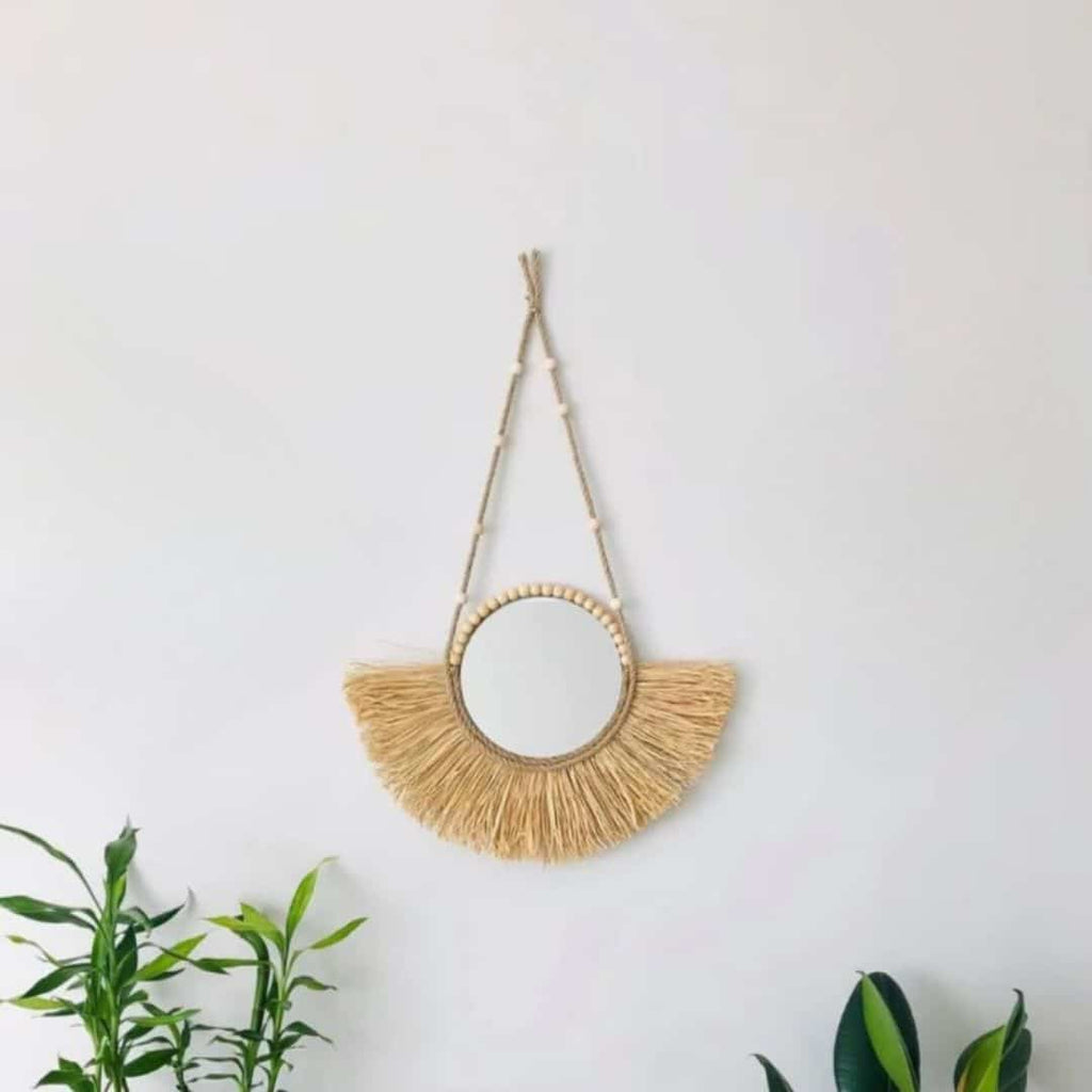 Round mirror with half moon straw fringe and wooden bead hanger