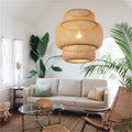 Hand woven natural bamboo pendant light with a modern geometric shape