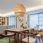 Hand woven natural bamboo pendant light with a modern geometric shape