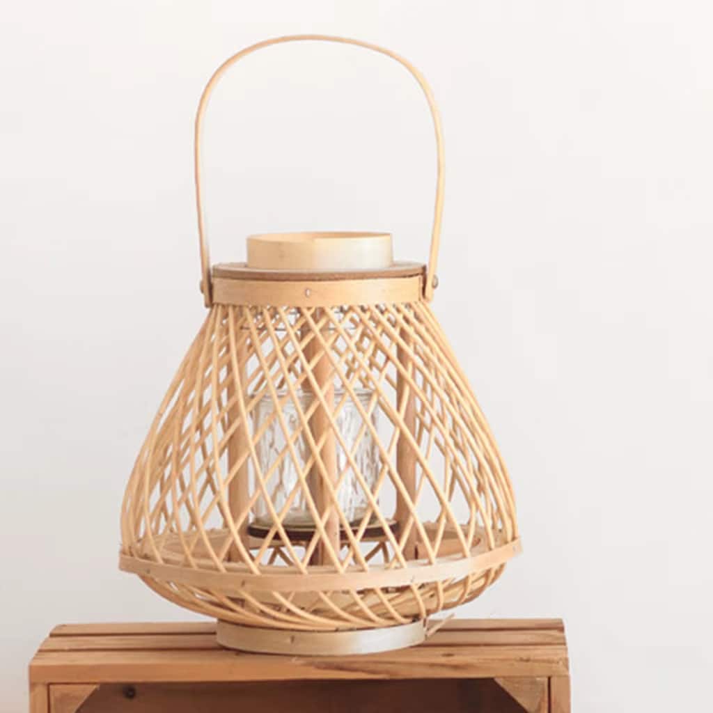 Hand woven rattan and bamboo candle lantern with a woven handle