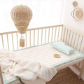 Hand woven beige rattan hot air balloon hanging decoration for a nursery