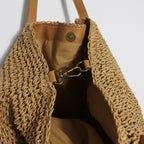 Hand woven straw handbag with a dense, even texture in brown or beige