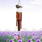 Brown bamboo wind chime with a coconut shell top and bamboo tubes