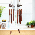 Brown bamboo wind chime with a coconut shell top and bamboo tubes