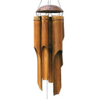 Long brown bamboo wind chime with a coconut shell top