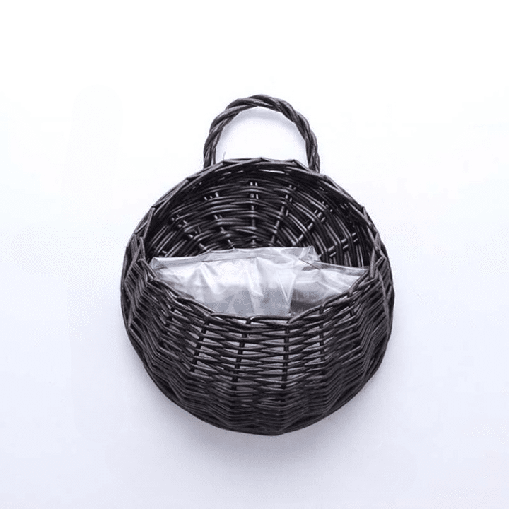 Half round rattan wall basket with a hanging loop