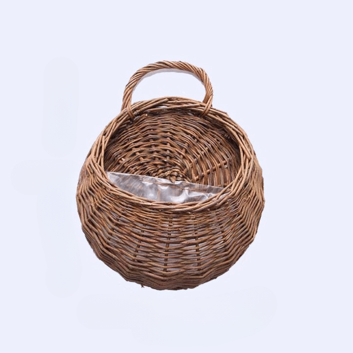 Half round rattan wall basket with a hanging loop