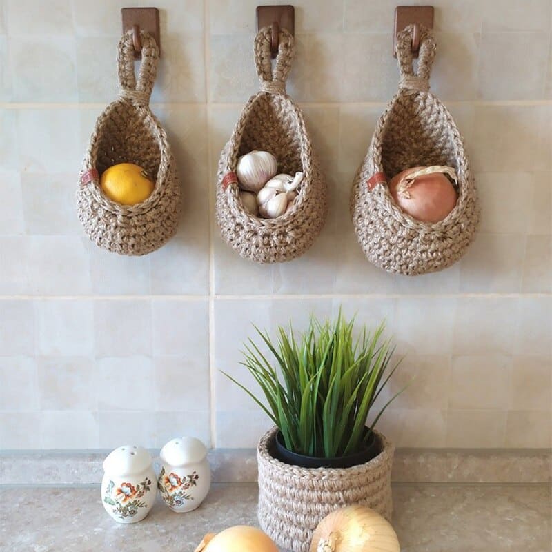 Teardrop woven wall baskets hanging on kitchen hooks