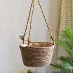 Round hand woven rattan hanging planter with fringe and three cords