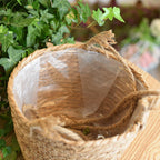 Round hand woven rattan hanging planter with fringe and three cords