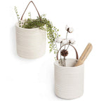 Round white woven hanging basket with a leather strap