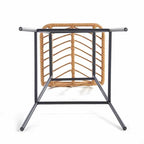 Tall bar chair with a hand woven rattan back and slim black metal legs