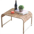 Rectangular Indonesian style coffee table in tightly woven beige wicker on wood legs