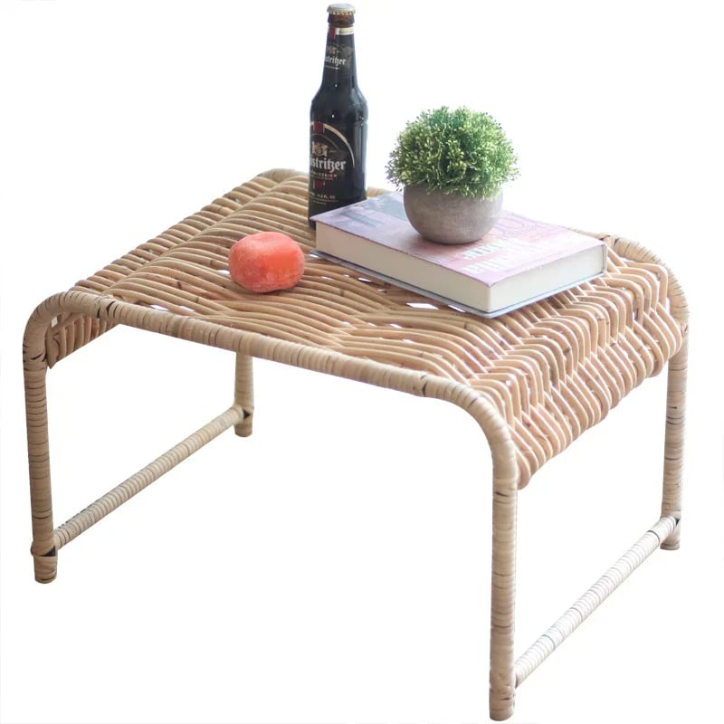 Rectangular Indonesian style coffee table in tightly woven beige wicker on wood legs