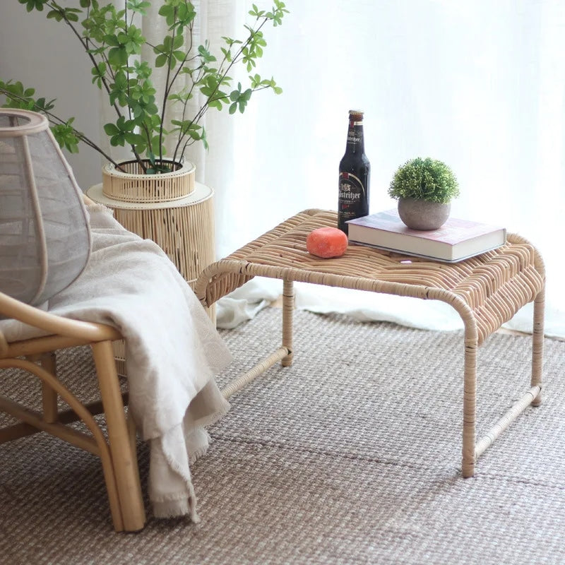 Rectangular Indonesian style coffee table in tightly woven beige wicker on wood legs