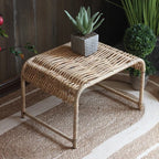 Rectangular Indonesian style coffee table in tightly woven beige wicker on wood legs