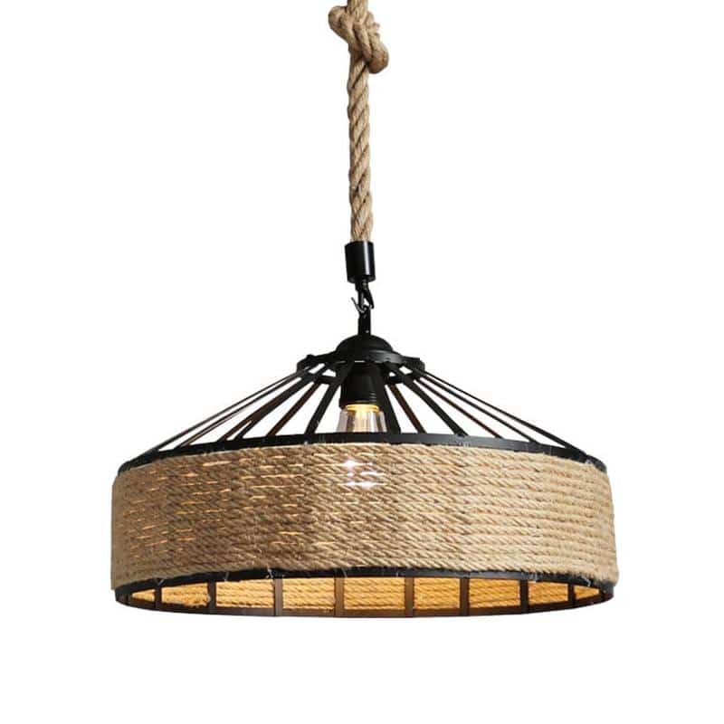 Industrial pendant light with a round black metal frame and a hand woven wicker shade hung by a rope