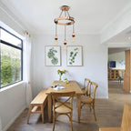 Industrial chandelier with three natural wood arms and raw metal sockets