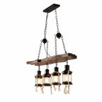 Industrial pendant light with a natural wood branch and four geometric black metal lanterns