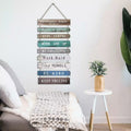 Hanging wood slat wall sign with positive quotes in soft colors