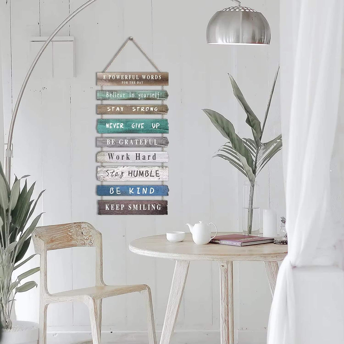 Hanging wood slat wall sign with positive quotes in soft colors