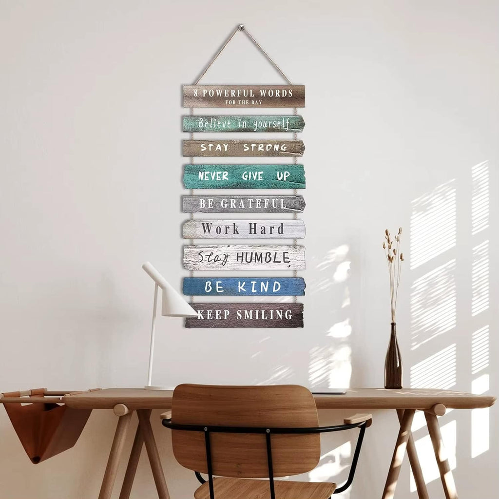 Hanging wood slat wall sign with positive quotes in soft colors