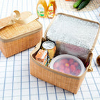 Small insulated picnic lunch bag with a woven look and carry handle