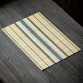 Rectangular Japanese style placemat of finely assembled bamboo slats