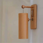 Japanese style wooden wall door chime with a hanging bamboo tube