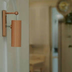 Japanese style wooden wall door chime with a hanging bamboo tube