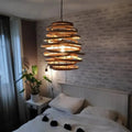 Round Japanese style pendant light hand woven in natural wicker