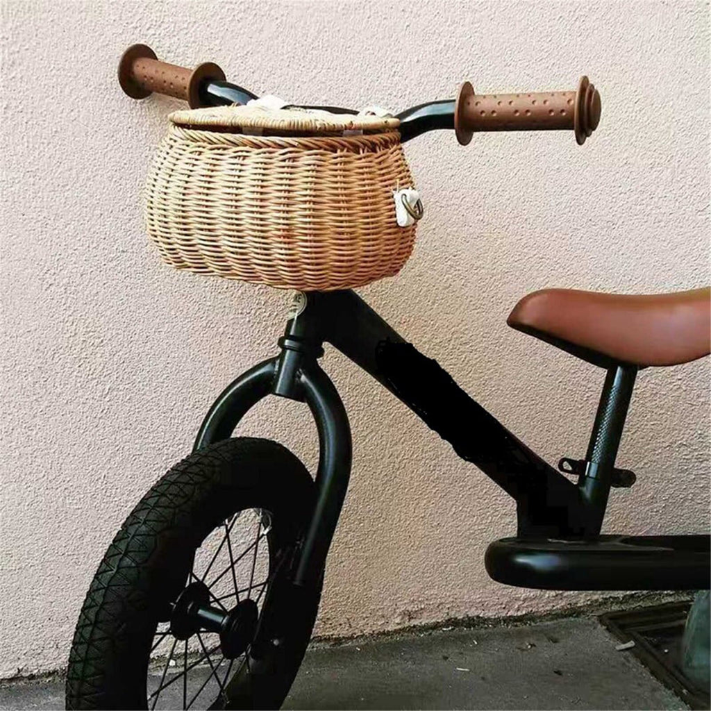 Small lidded wicker kids basket with a white strap