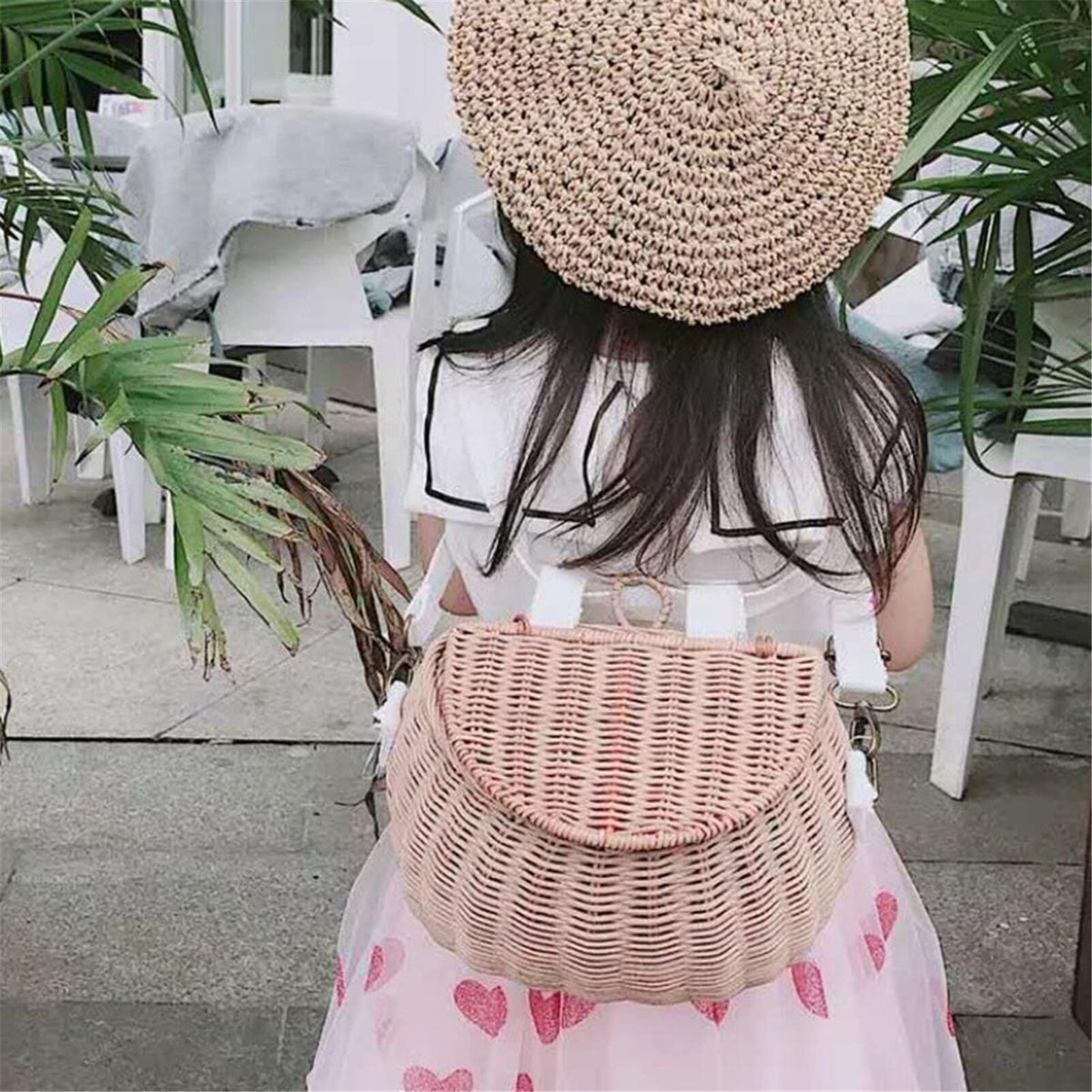 Small lidded wicker kids basket with a white strap