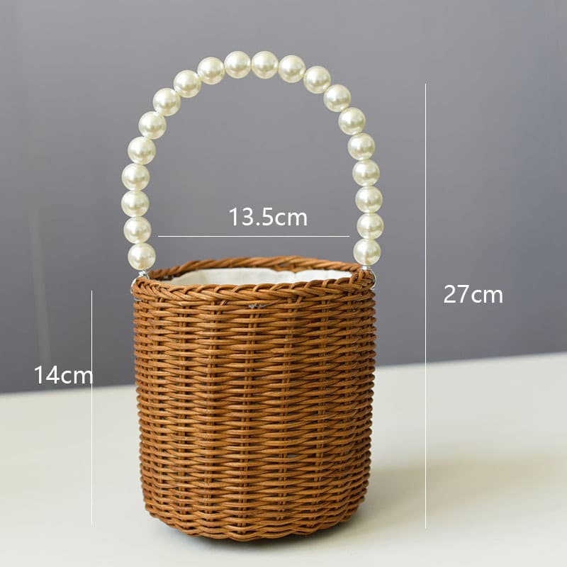 Small woven basket with bead handle and white drawstring liner