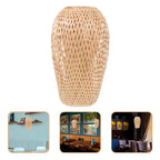 Tall lantern shaped lamp shade hand woven in natural rattan