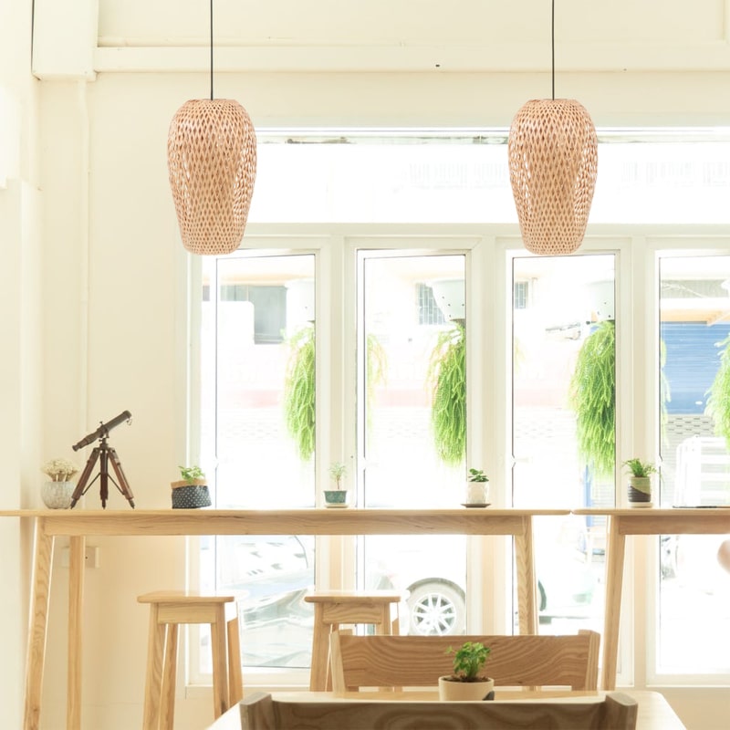 Tall lantern shaped lamp shade hand woven in natural rattan