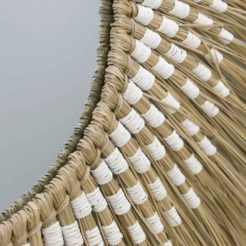 Large round mirror with a wide natural straw sunburst halo