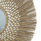 Large round mirror with a wide natural straw sunburst halo