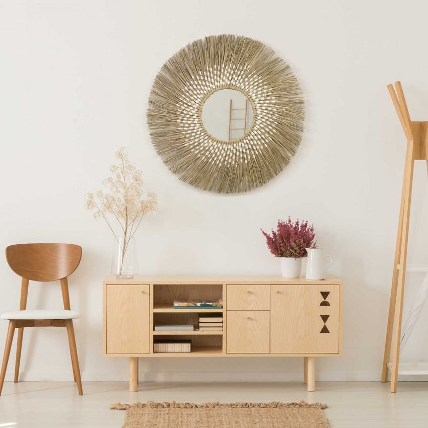 Large round mirror with a wide natural straw sunburst halo