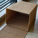 Large brown woven rattan trash can with a lid and two side handles
