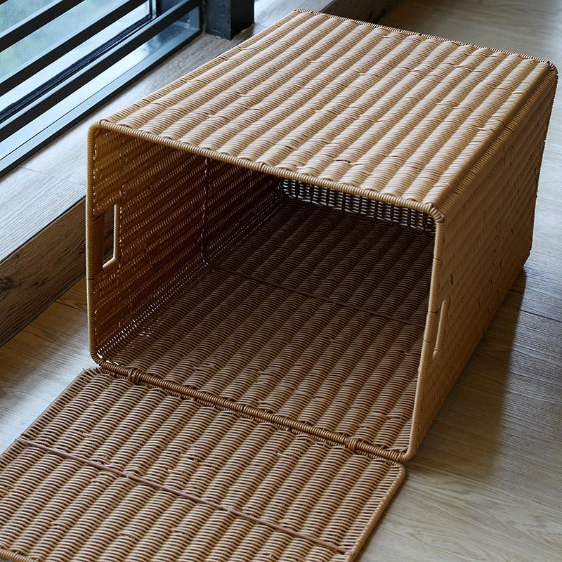Large brown woven rattan trash can with a lid and two side handles