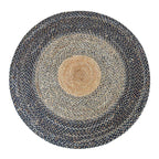 Large round braided rug with a natural center and dark blue gray rings