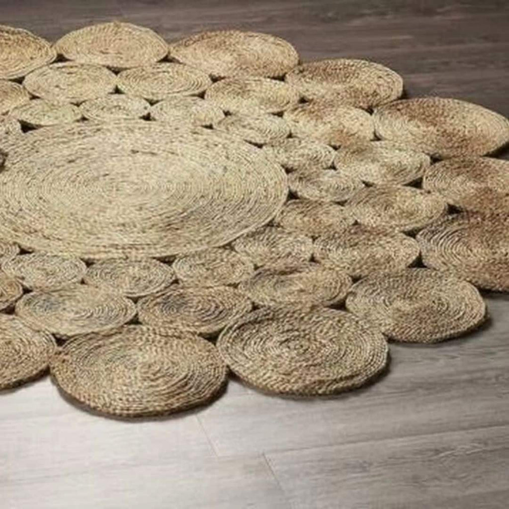 Large round jute rug made of braided circles