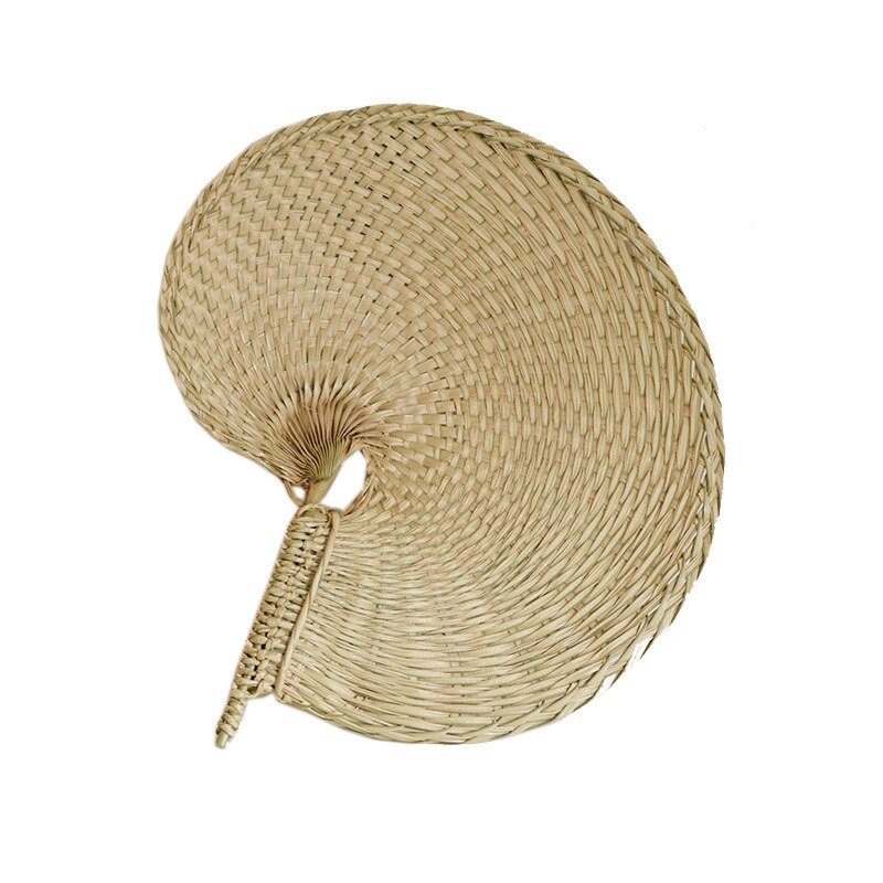 Large round woven fan on a bamboo frame, shown in a group on a console