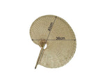 Large round woven fan on a bamboo frame, shown in a group on a console