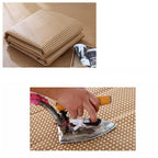 Large square woven rattan mat under a low table