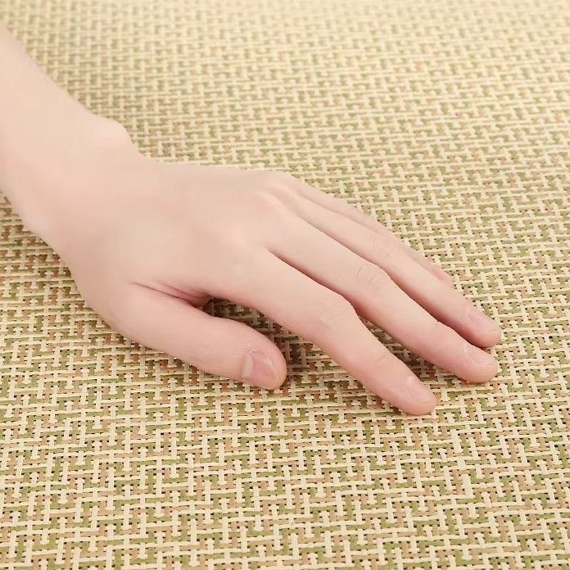 Large square patterned rattan mat in a bright living room