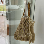 Large structured summer tote hand woven in natural straw with long handles